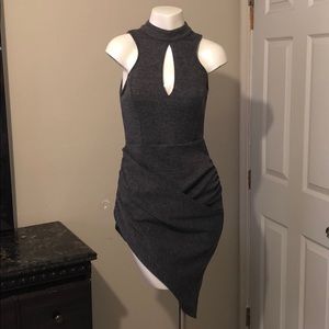 Beautufl asymmetric dress new with tags size M